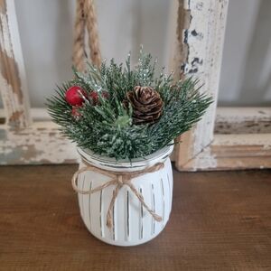 Festive White Holiday Jar with Greenery and Pinecone